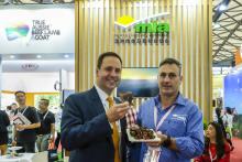 Federal Minister for Trade, Tourism & Investment Steven Ciobo at the Shanghai SIAL Food Industry Expo trying Austrslian beef with the MLA's GM Michael Finucan.Photo credit: DFaT/Chris CrerarHigh res filename reference: 4096