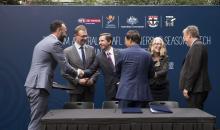 Federal Minister for Trade, Tourism & Investment Simon Birmingham shakes hand with AFL China's David Stevenson, with MD of Tourism Australia John O'Sullivan (centre left), Shanghai Cred Chairman Gui Goije Australian Ambassador Jan Adams, Port Adelaide CEO